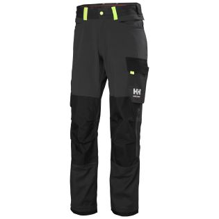 HLAČE HH 77395 OXFORD 4X CNCT, T. SIVE ČRNE HELLY HANSEN WORKWEAR HLAČE HH 77395 129321